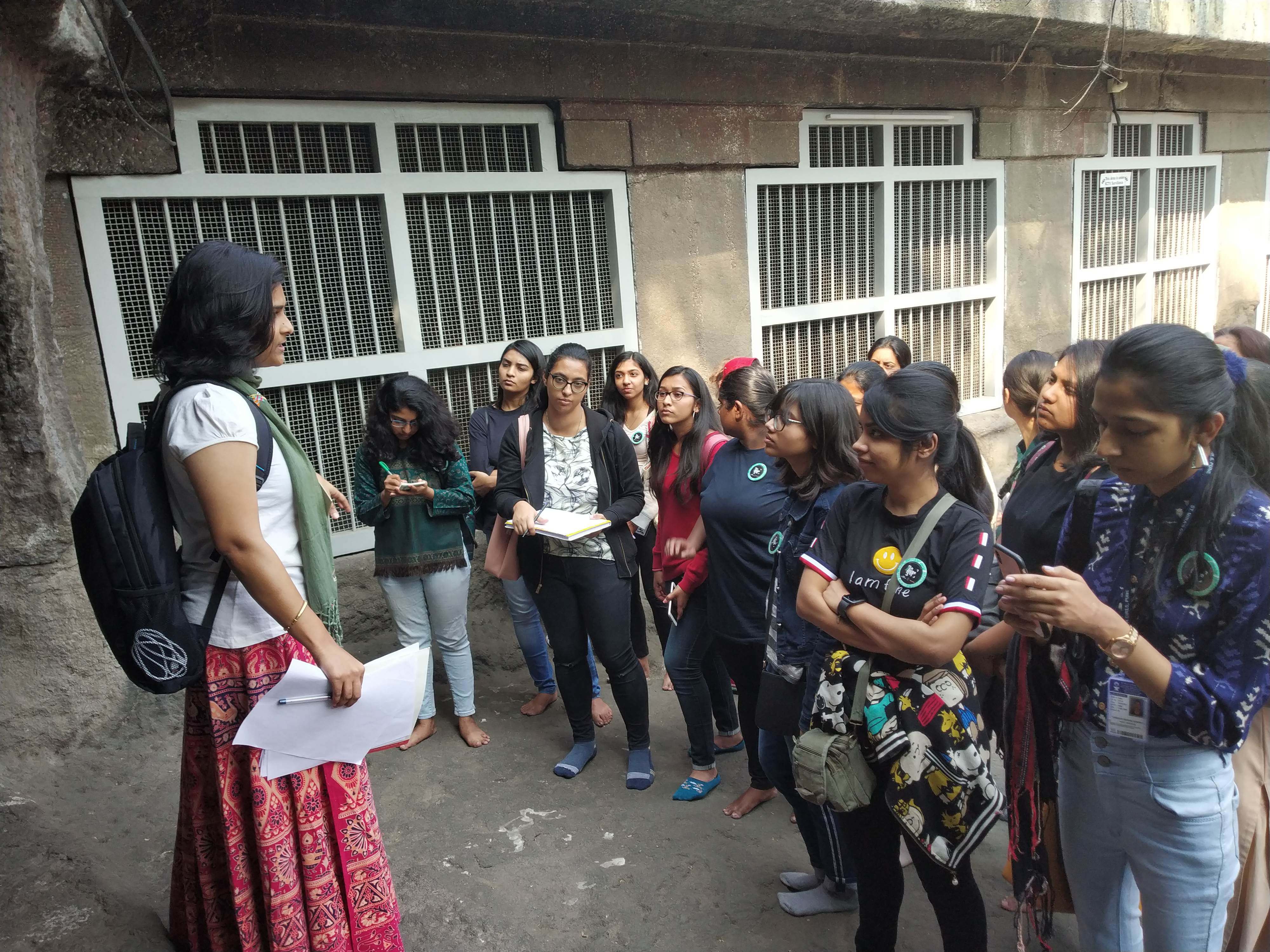 Heritage Walk Pataleshwar Caves Students taking notes At the Cell_Dept. of History