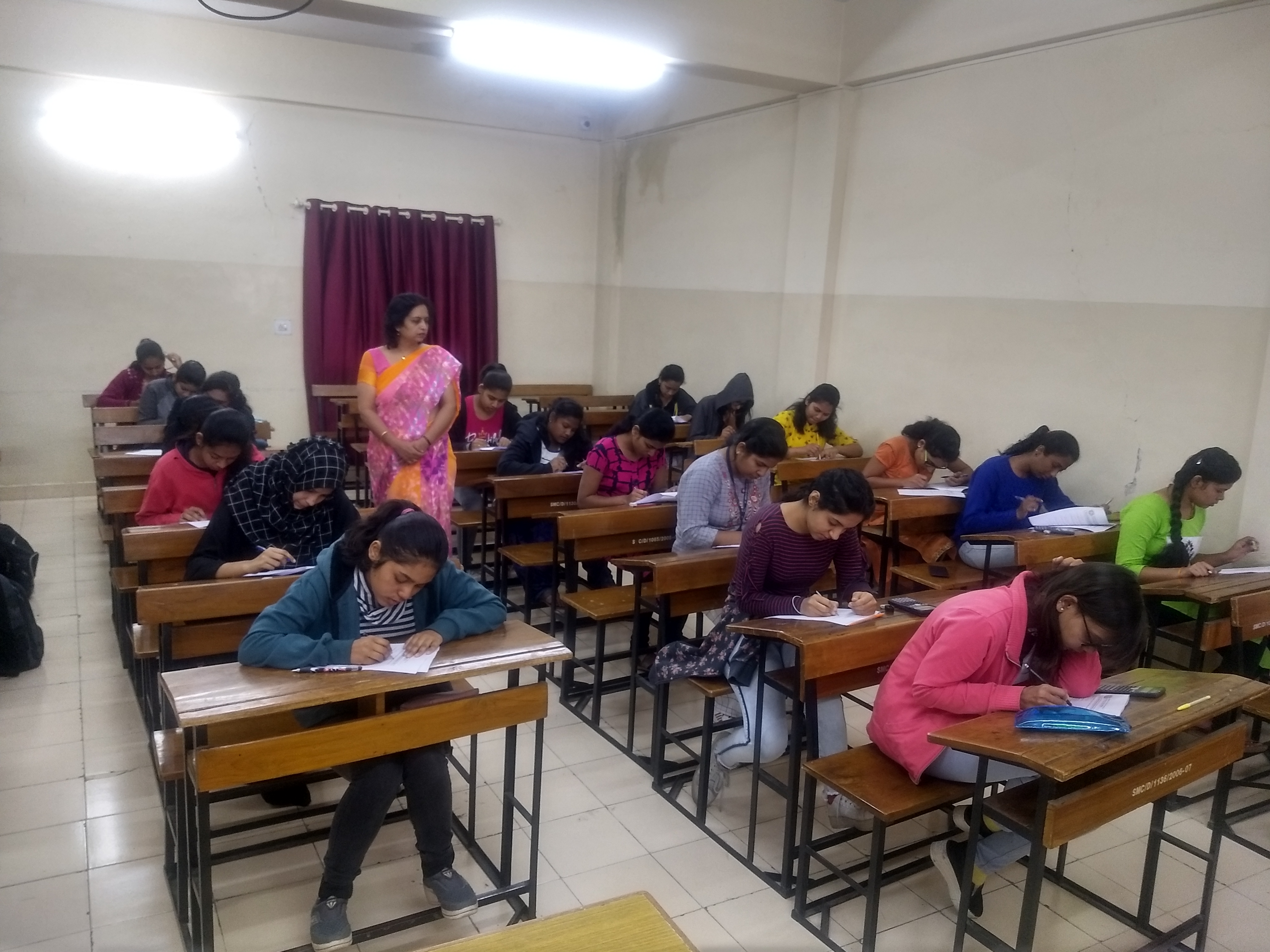 Students writing SPEED exam