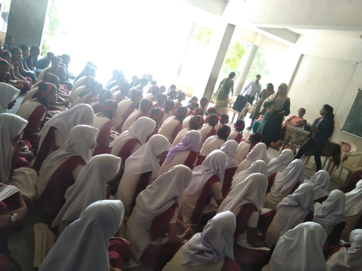 Volunteers adressing the school girls