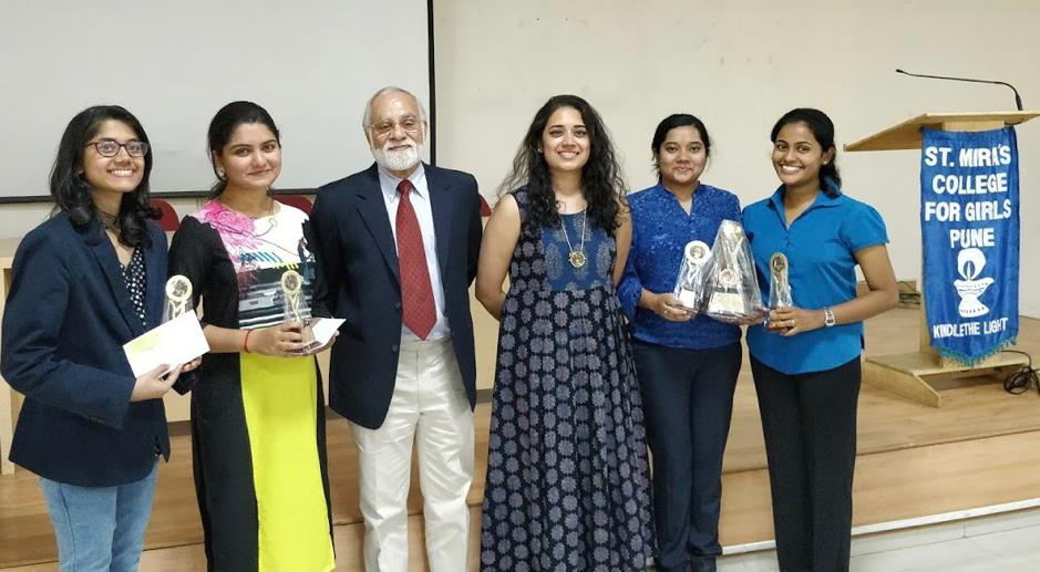 The Runner – Up Team and the 2<sup>nd</sup> Best Speaker prize winners, Sharon Chandekar and
														Harshika Shirgaokar from Ness Wadia College along with the judges, Mr. Suraj Sriram
														and Ms. Priyanka Menon, and the Best Team winners Ayushi Halder and Swathi Satish
														from St. Mira’s College.