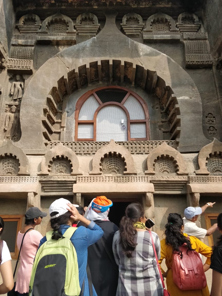 Students engrossed at Ajanta Cave