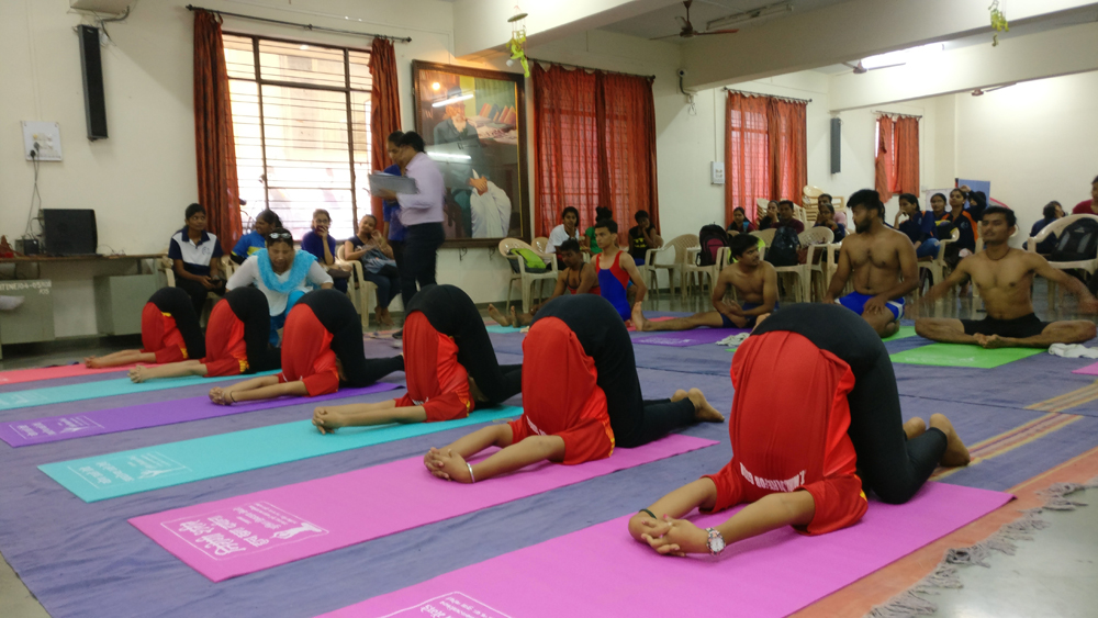 Inter Collegiate yoga Competition our team secured Second Place. (while performing karna pindakonasana)