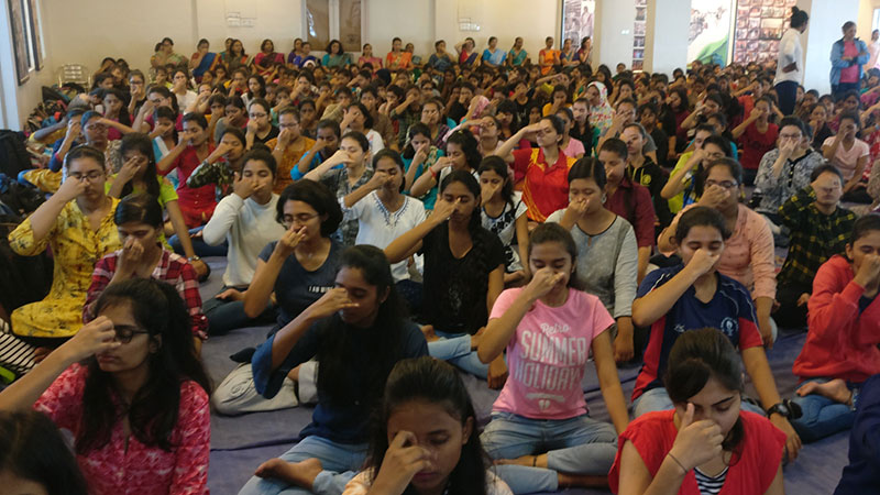 Students while performing Anuloma Viloma Pranayama