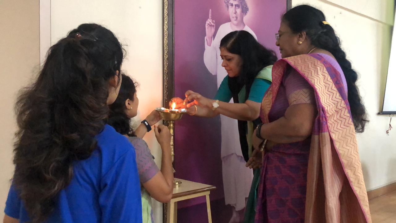 Lighting of the Lamp by Vice-principal, Dr. Shalini Iyer, Ms. Stella Ambrose and NSS POs