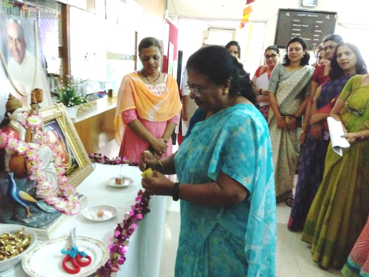 Mrs Stella Ambrose Lighting the Lamp