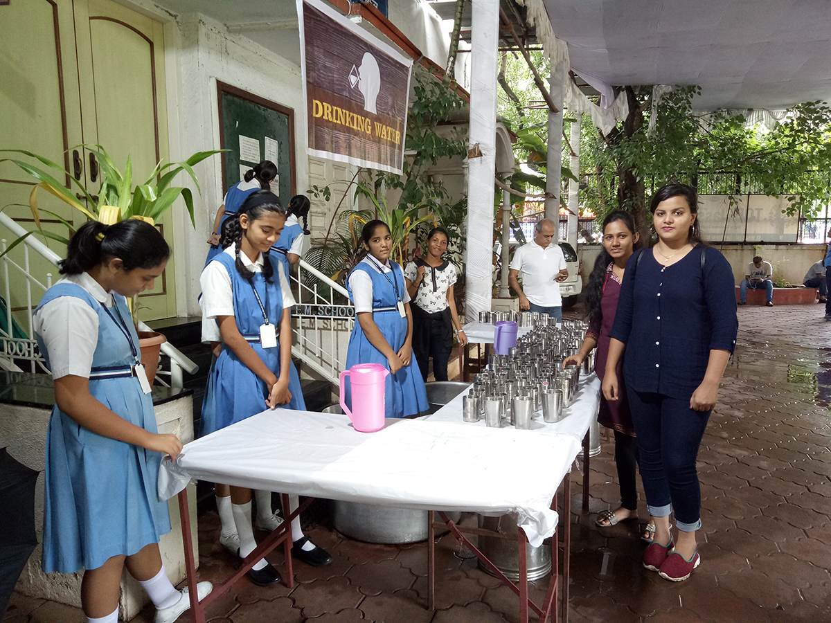 NSS volunteers serving water