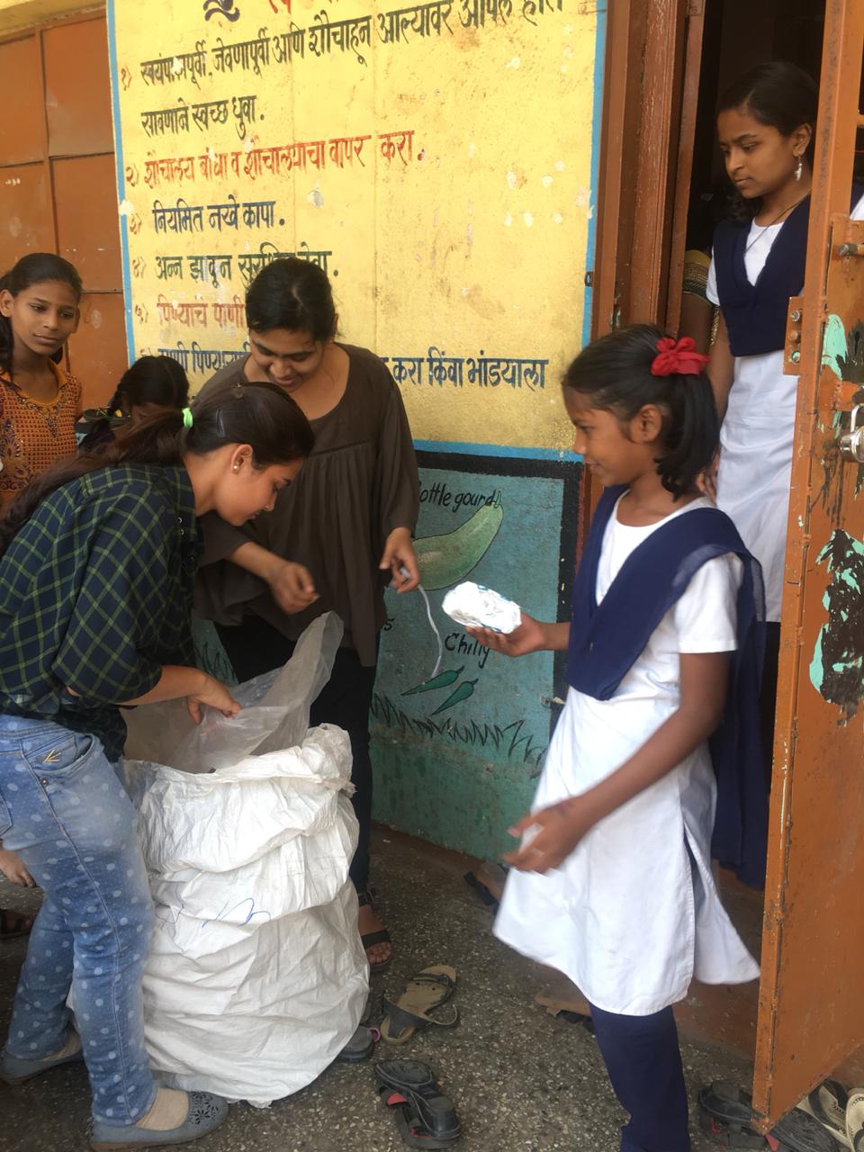 Sanitary napkin distribution at Chakan School