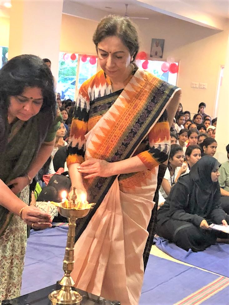 Our principal & vice principal lighting the samai in the fond memory of Sadhu T. L. Vaswani Dada J