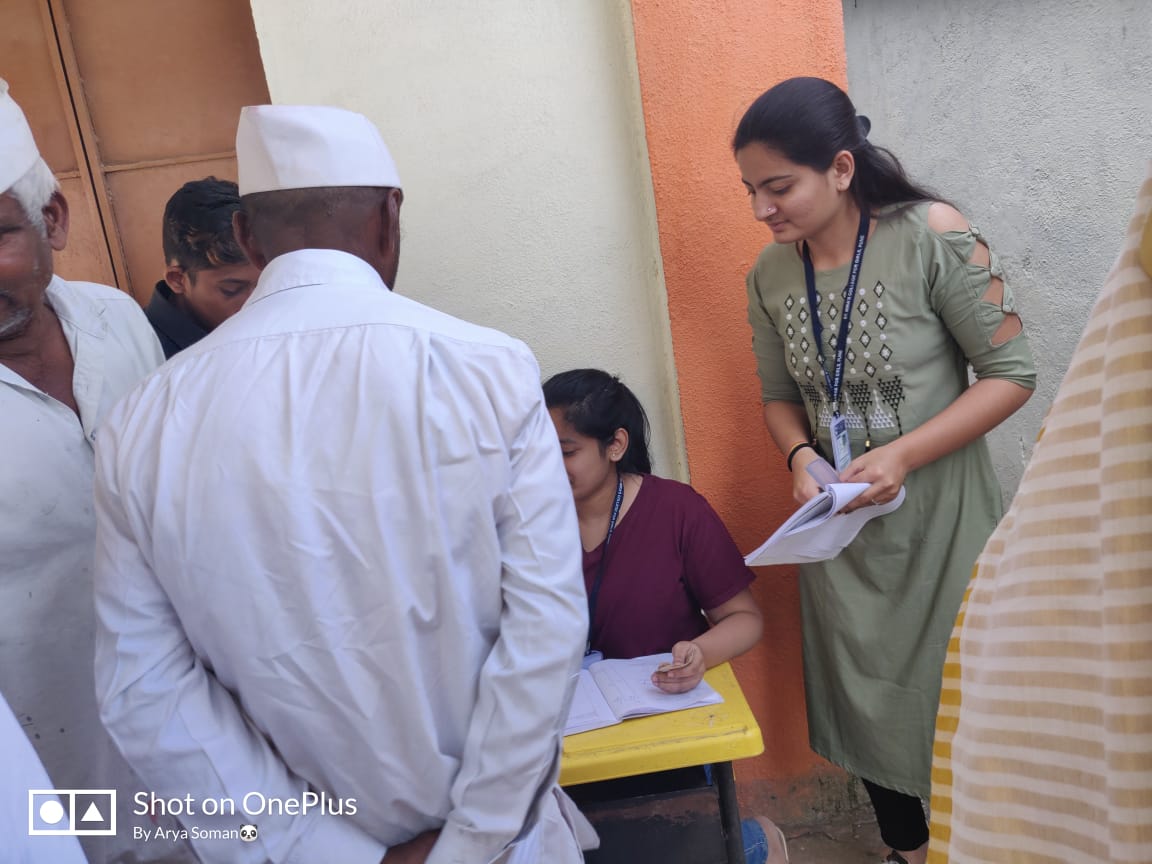 Volunteers helping in checkup